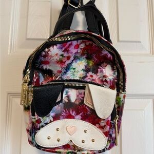 Betsey Johnson floral mini backpack featuring a dog face.